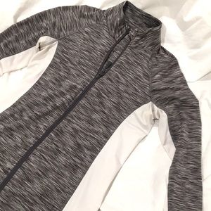 Gray and white jacket with zipper